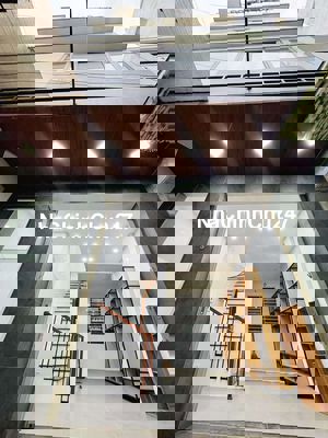 Nhà kiệt đống đa sau lưng nhà mặt tiền