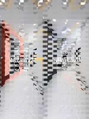 nhà ngay mặt tiền giáp tân phú , kenh nước đen