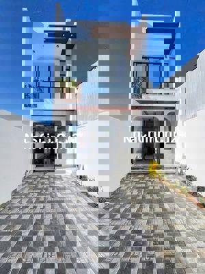 Bán Nhà Mới Xây 1 Trệt 1 Lầu Ngay Cây Xăng Bửu Long