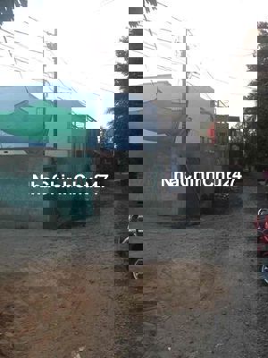 Đất mặt tiền TL 12, 6x20, lô góc, xây tường bao 2m, có điện nước