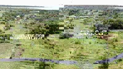 Đất vườn mặt tiền đường nhựa, sổ hồng riêng, suối ôm đất