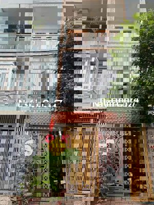 chủ bán nhà trệt 2 lầu đường nhựa 12 m khu dân cư gần trung tâm y tế